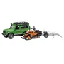 Land Rover Defender met sneeuwmotortrailer en Bruder Karakter 0...