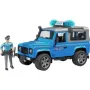 Land Rover Defender met politieagent en accessoires en zwaailicht...